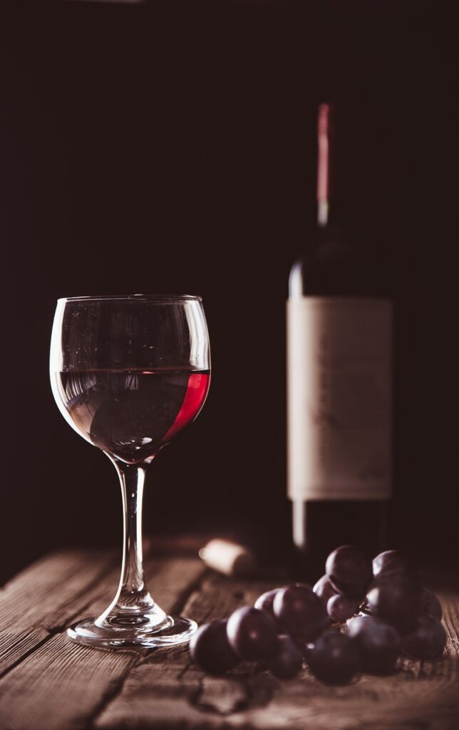 wine, bottle, grapes, glass, red wine, wine glass, wine bottle, stemware, glassware, drink, beverage, alcoholic drink, still life, wine, wine, wine, wine, wine, red wine, still life, still life